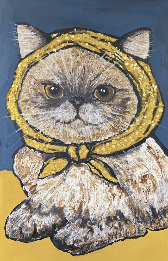 Cat in a yellow scarf · Chloe